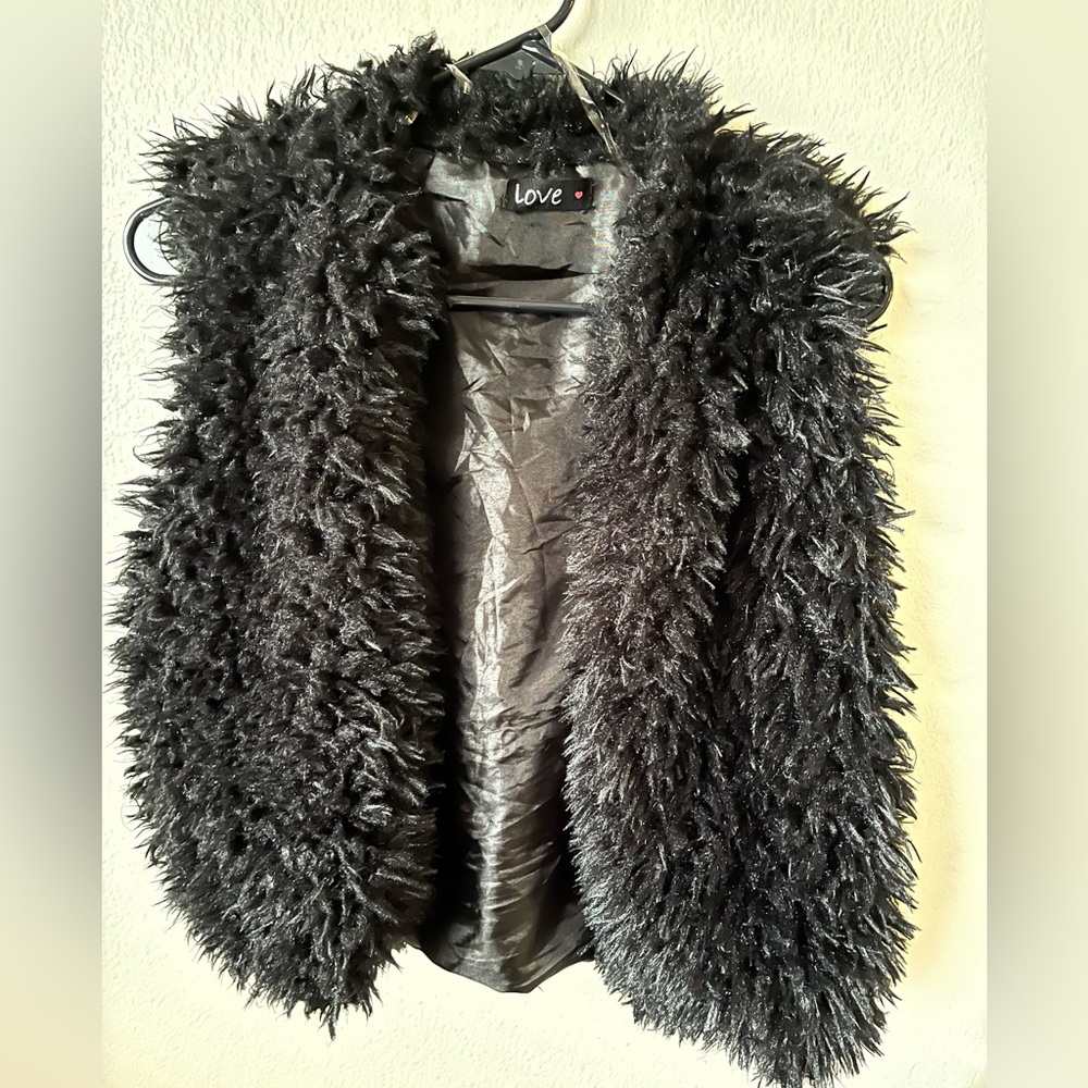 Girls large fluffy sweater vest!